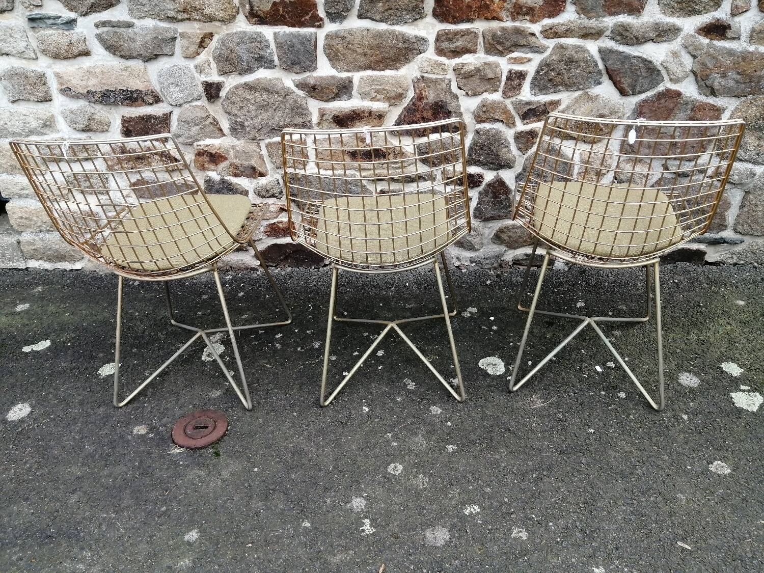 Three chairs in the style of Harry Bertoia