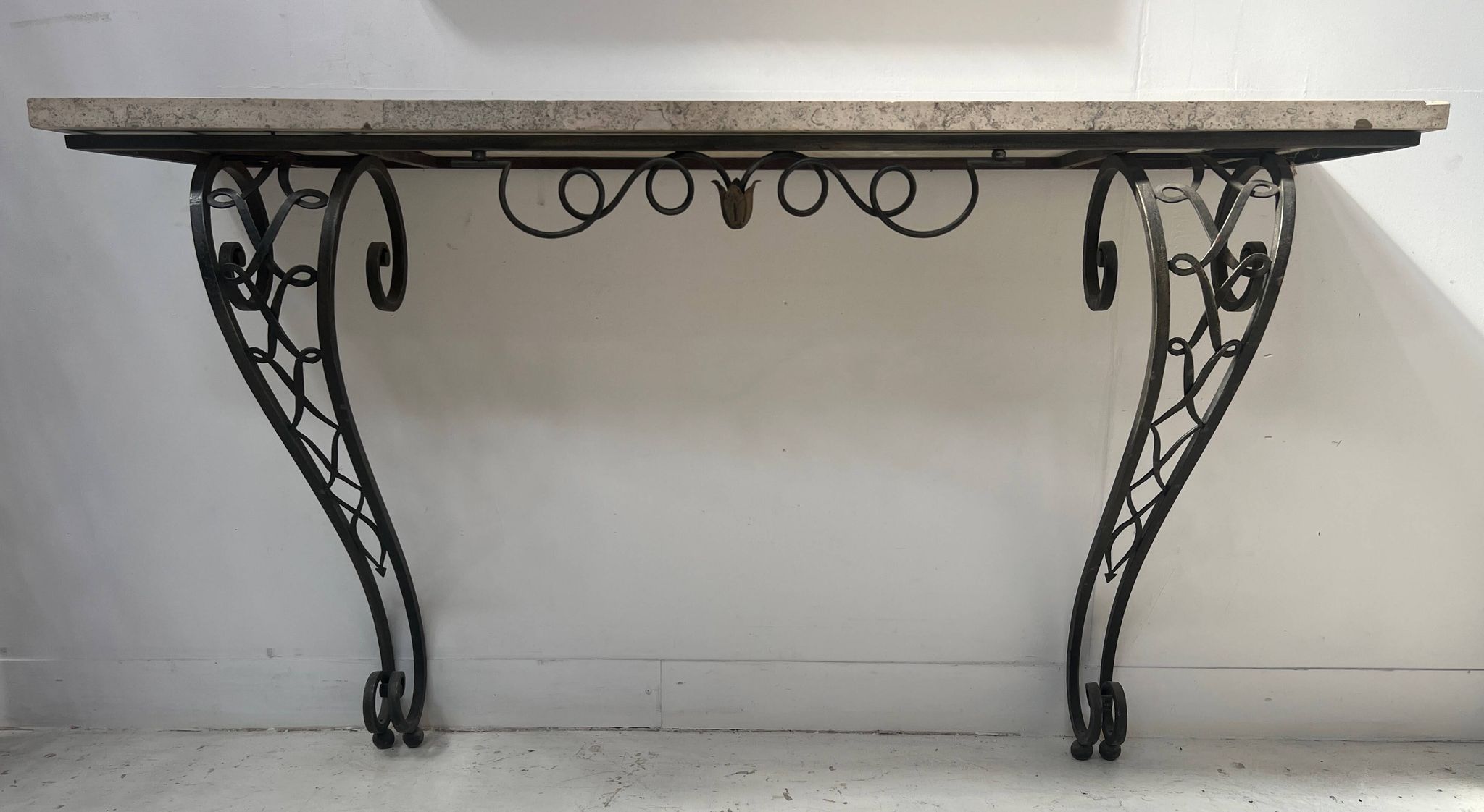 Art Deco console in hammered wrought iron, 20th century.