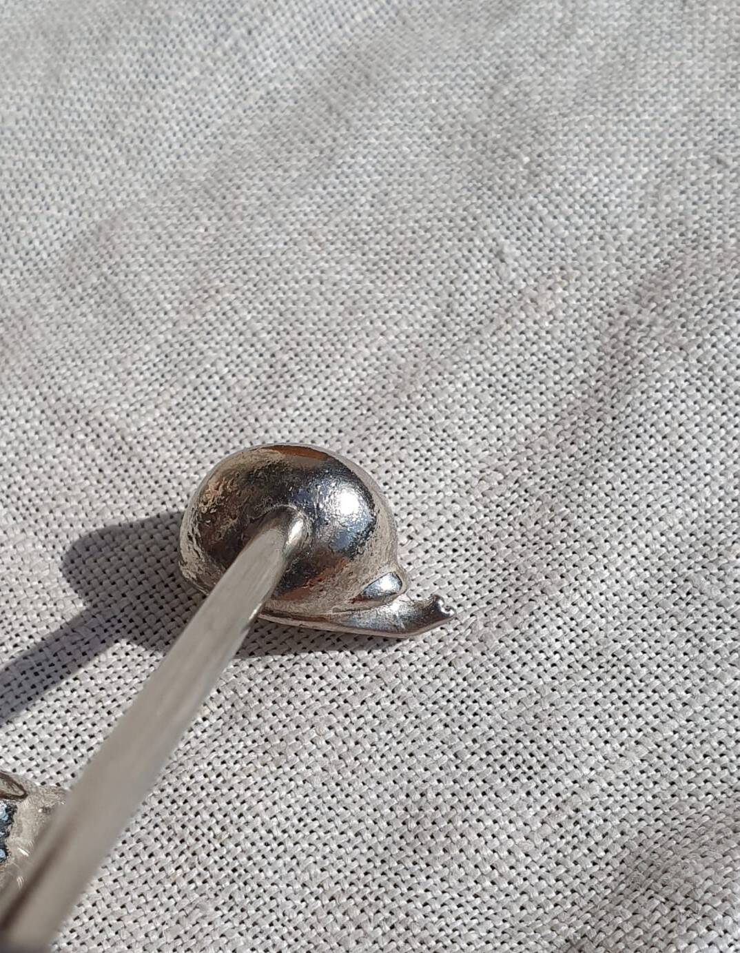 expensive silver metal snail door