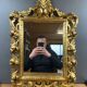 Miroir ancien style Louis XV en bois sculpté doré