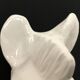 Pair of vintage white ceramic weighted horse bookends. 80 years