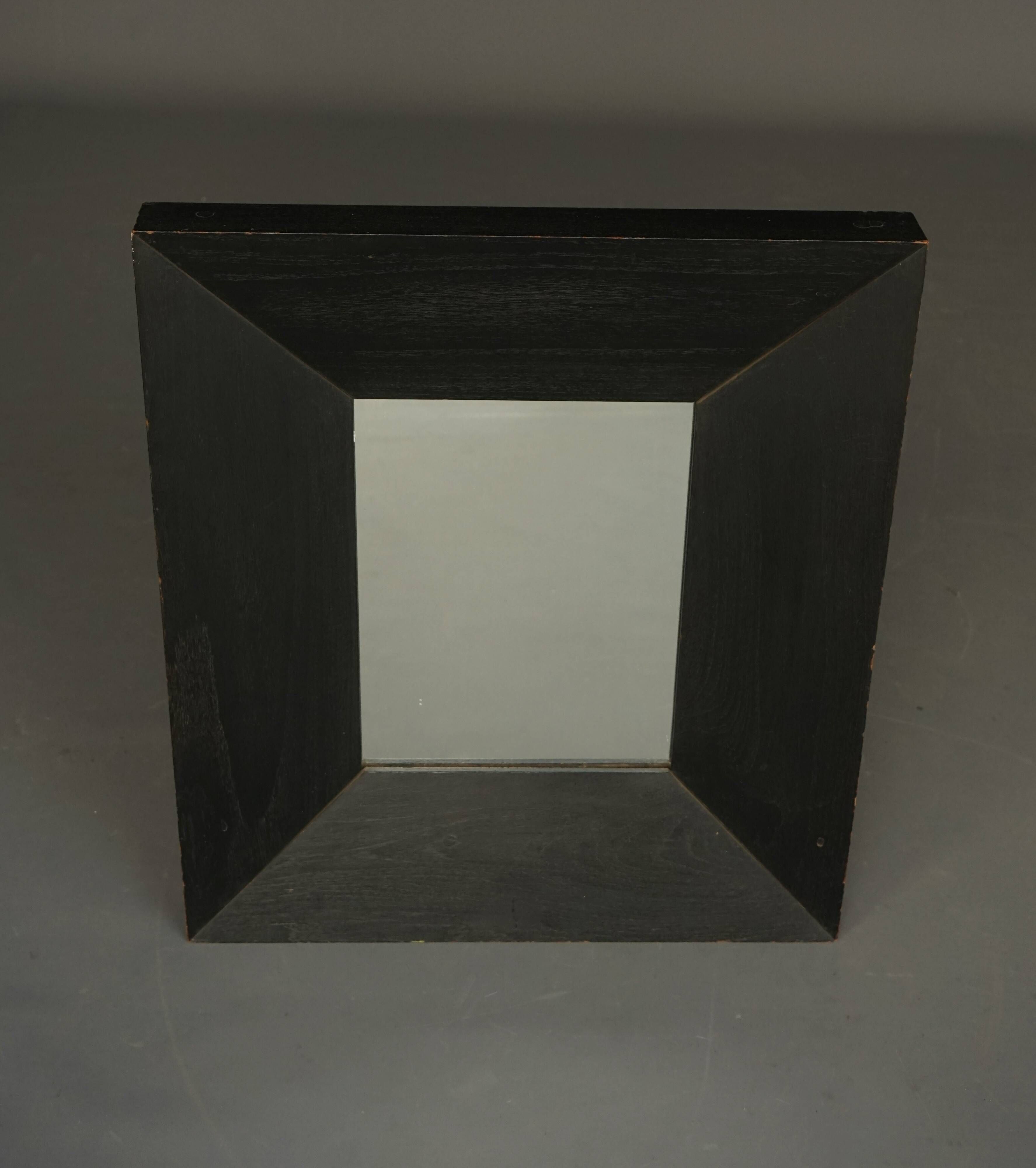 Thick framed vintage wall mirror