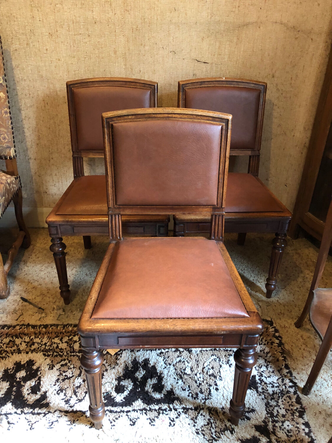 Leather and wood chairs