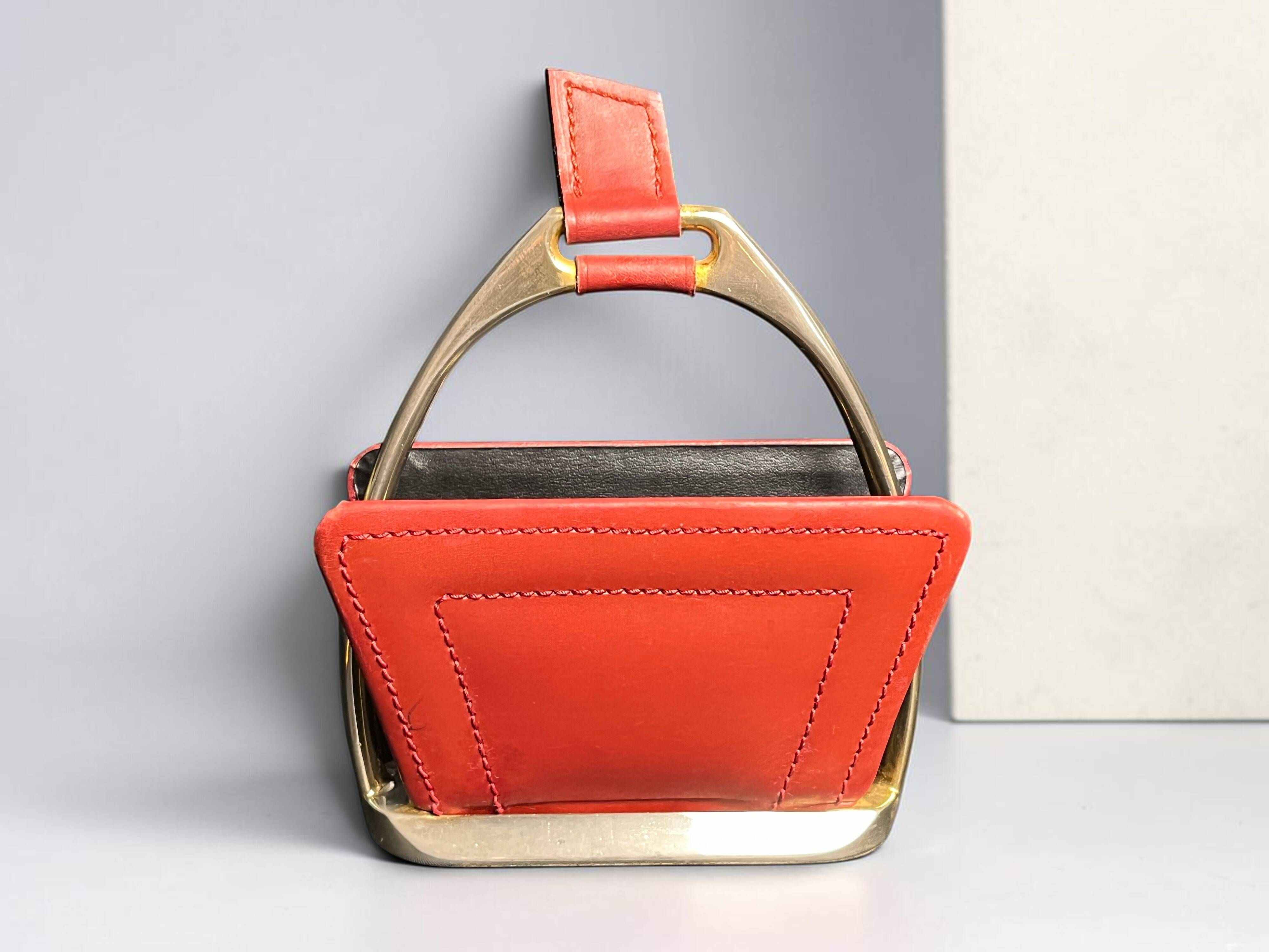 Longchamp, empty pocket document holder with leather and gold metal stirrup from around 1970.
