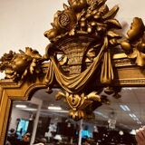 Antique English golden barock mirror mirror with large ornament