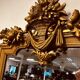 Antique English golden barock mirror mirror with large ornament