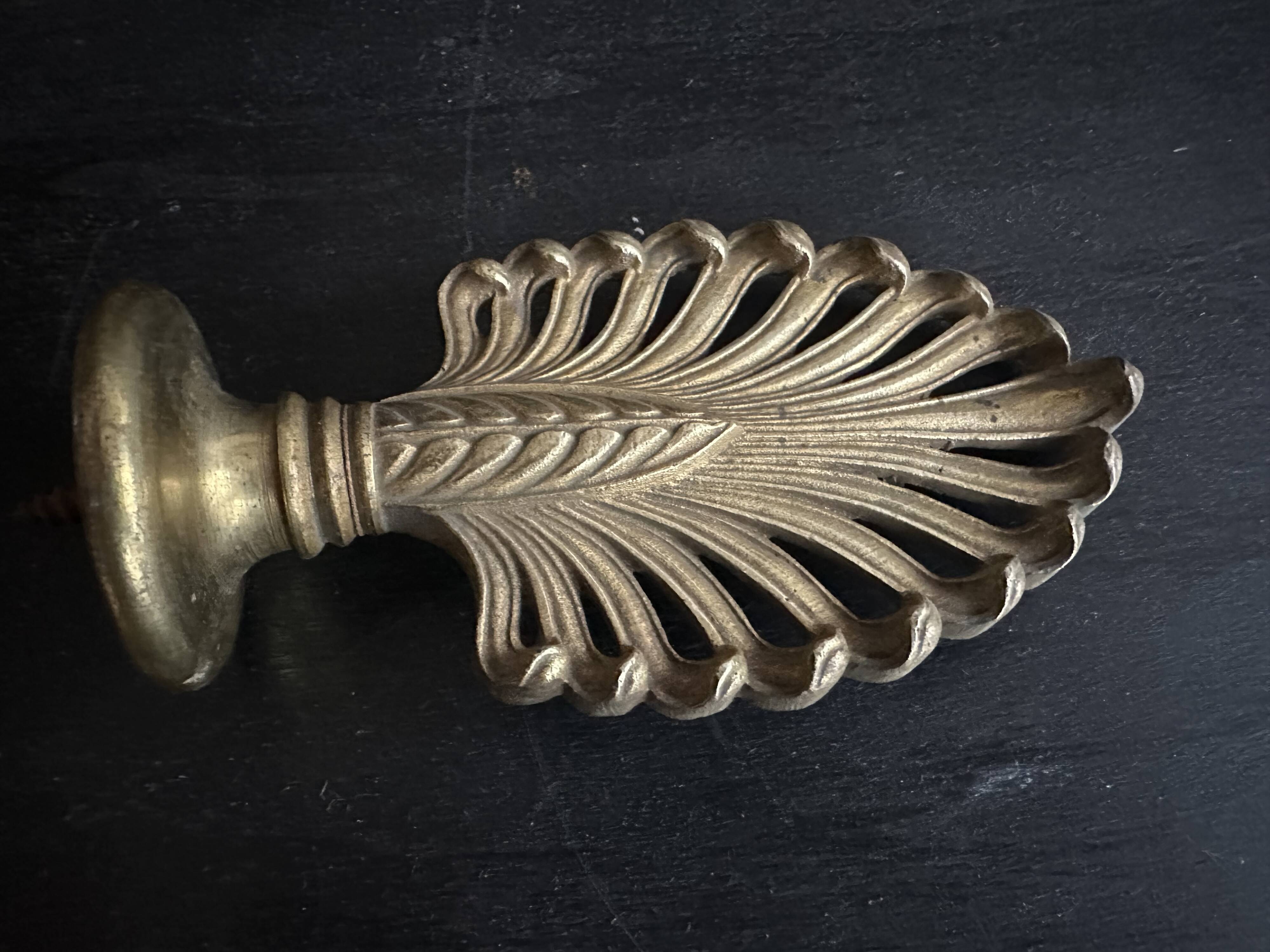 Pair of bronze curtain rod finials in the Napoléon III style with a palmette design.