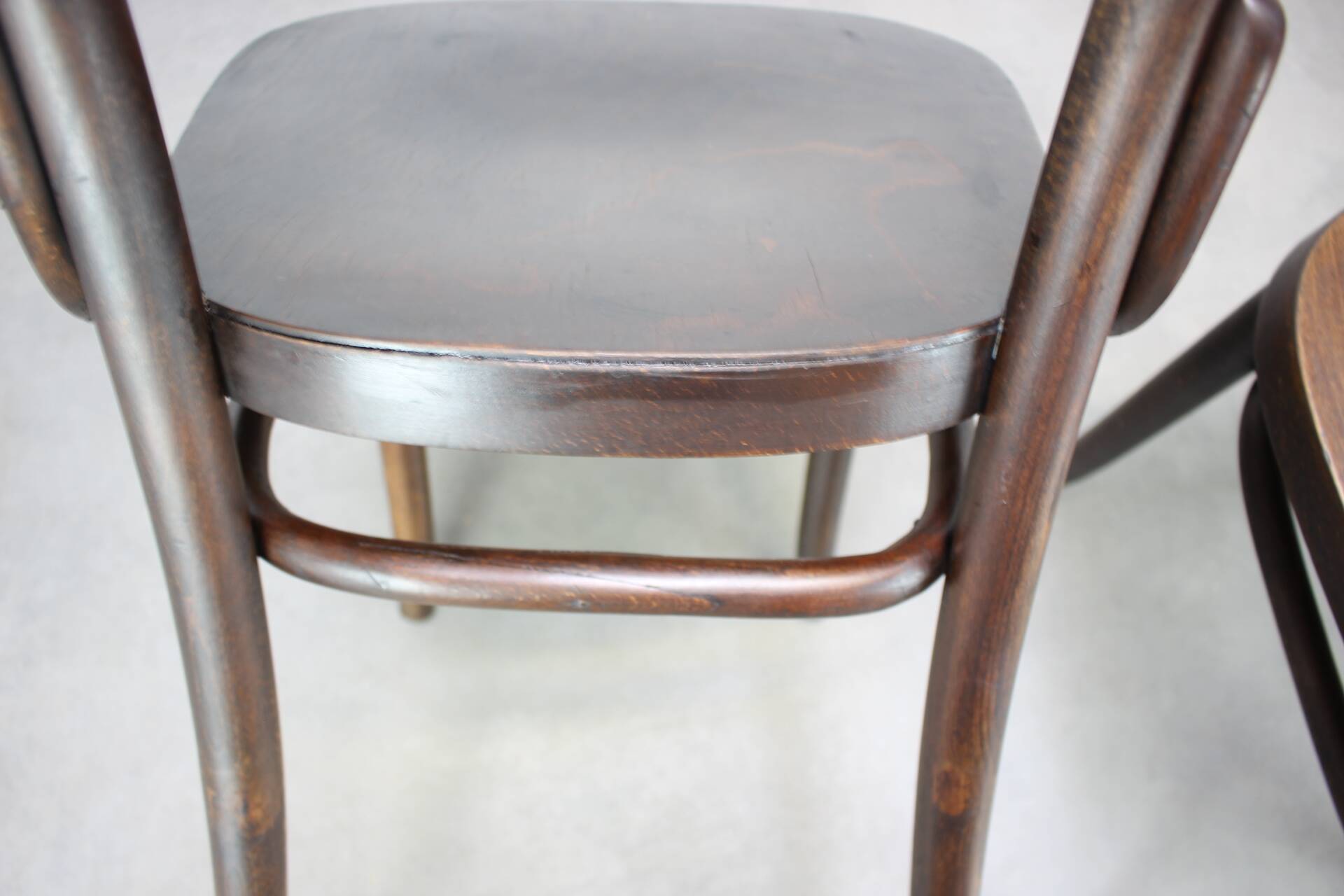 Pair of antique armchairs Model No B28 by Thonet, bent wood and caning, Austria 1920s.