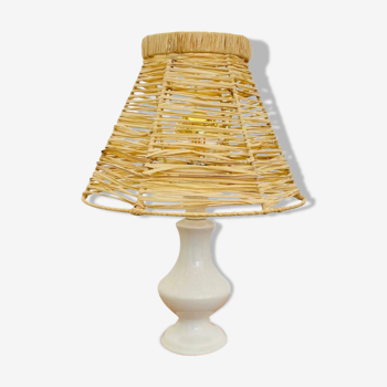 White porcelain table lamp and vintage raffia lampshade