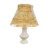White porcelain table lamp and vintage raffia lampshade
