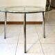 Table ronde design 1970 en verre et métal
