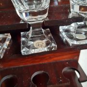 Old-fashioned glass liquor cellar and St Louis crystal decanters