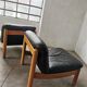 Pair of designer leather armchairs 80s