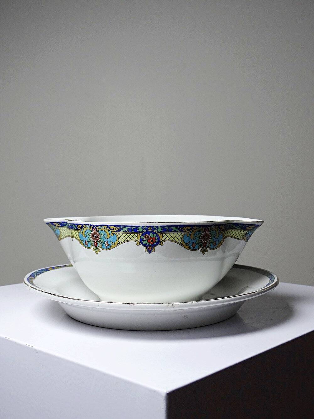 Old Luneville sauce boat, opaque porcelain with polychrome decoration.