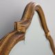 Miroir doré en arc avec sommet ogival mauresque, France, vers 1920