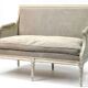 Louis XVI style canapé, in white lacquered wood.