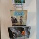 Metal wall-mounted magazine/book rack