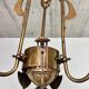 Art Nouveau chandelier with three arms and opalescent iridescent glass.