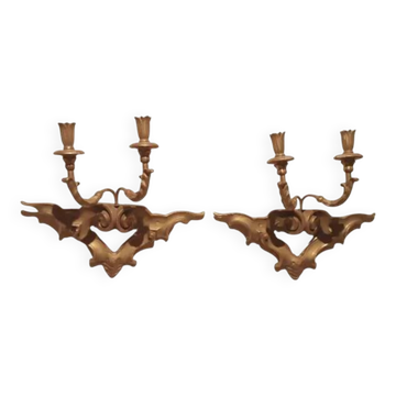 Pair of antique wall sconces in gilded wood from the 19th century.