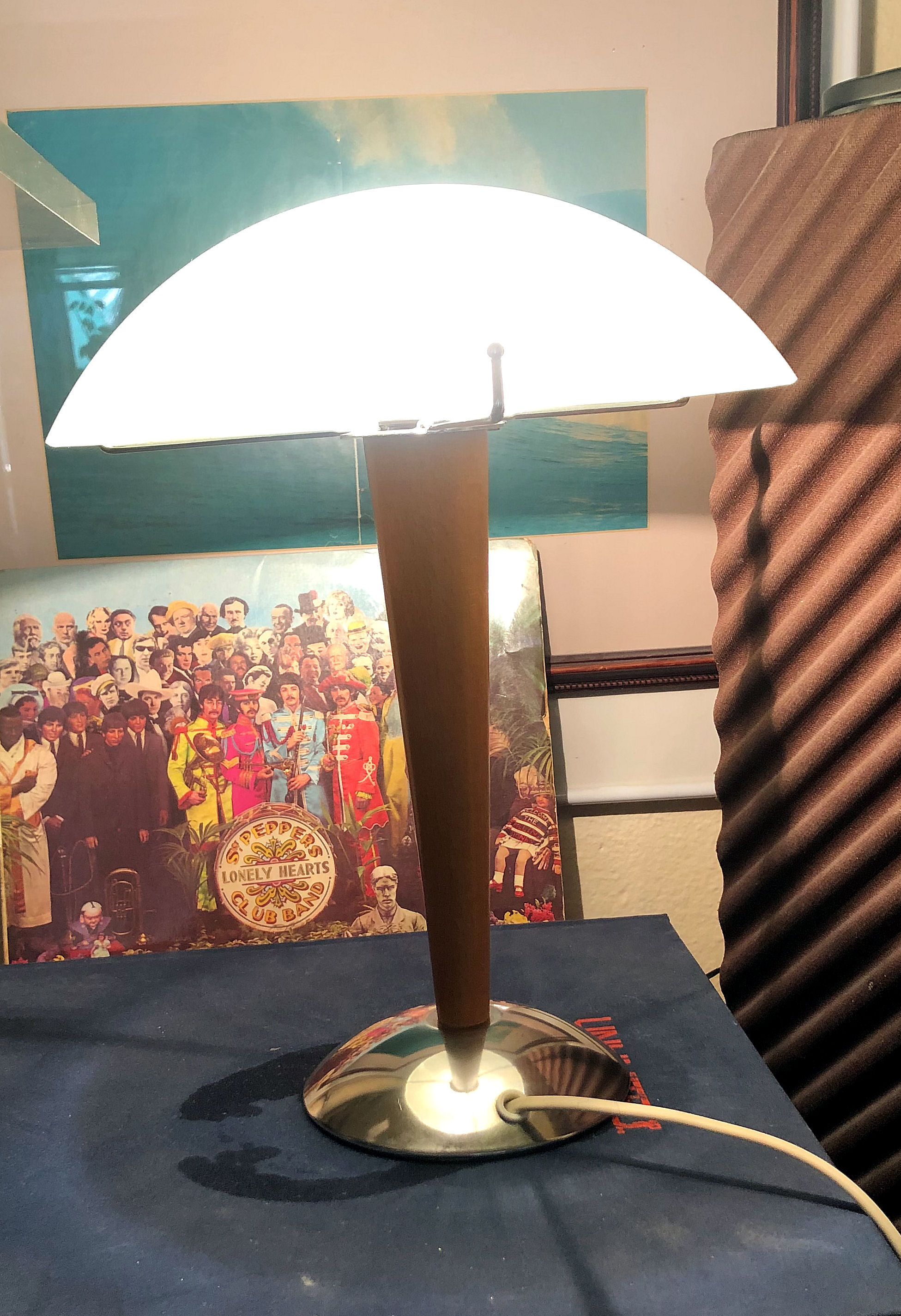 Table lamp legs chrome wood lampshade opaque glass.