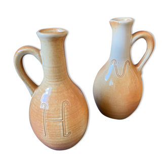 Bottles of beige sandstone varnished Oil and Vinegar