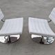 Pair of postmodern swivel armchairs in leather and chrome, Italy 1970s.