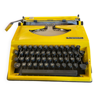 Yellow Triumph typewriter