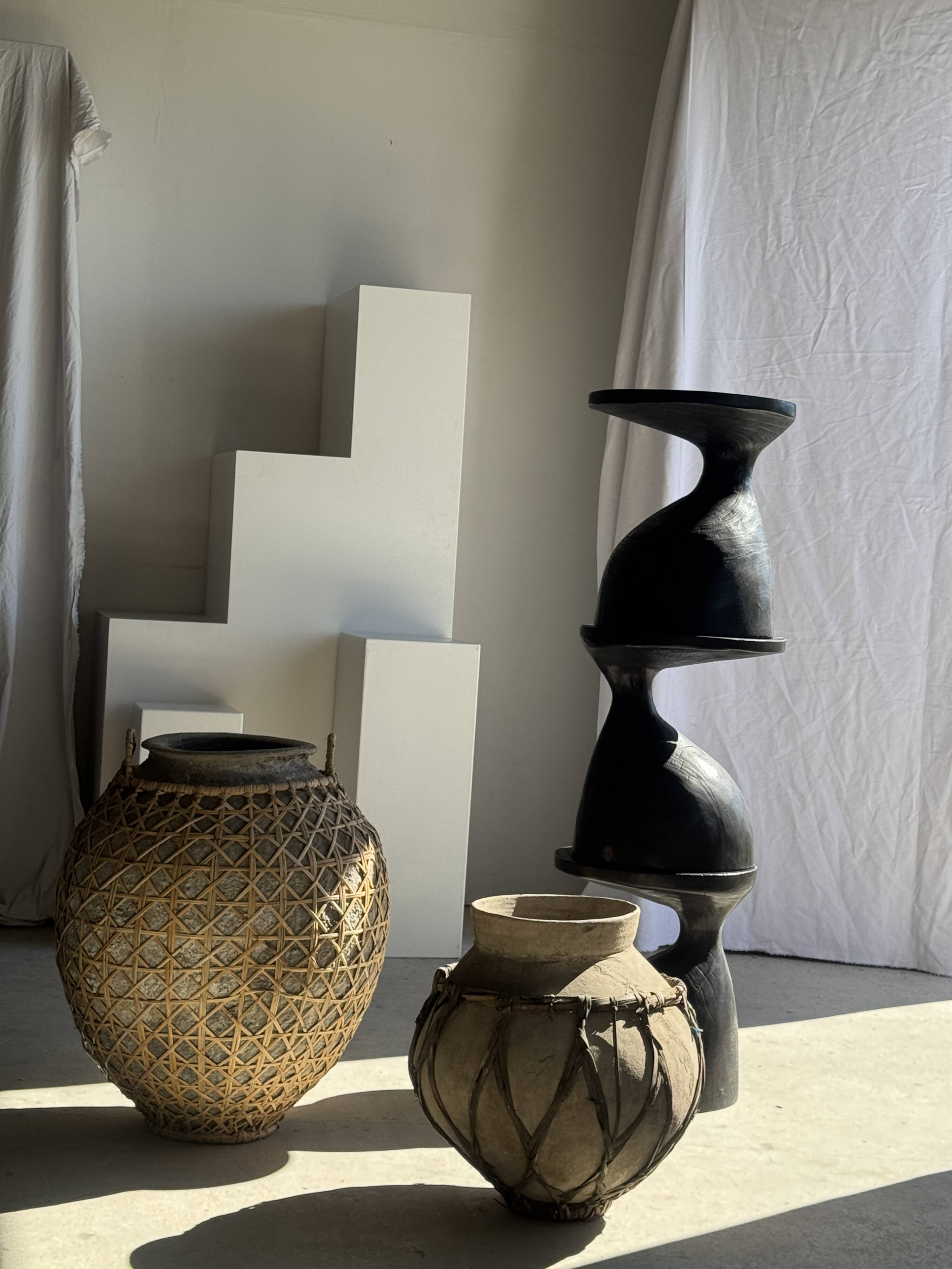 Immense light grey antique-style pot with a crosshatch lid and handles.