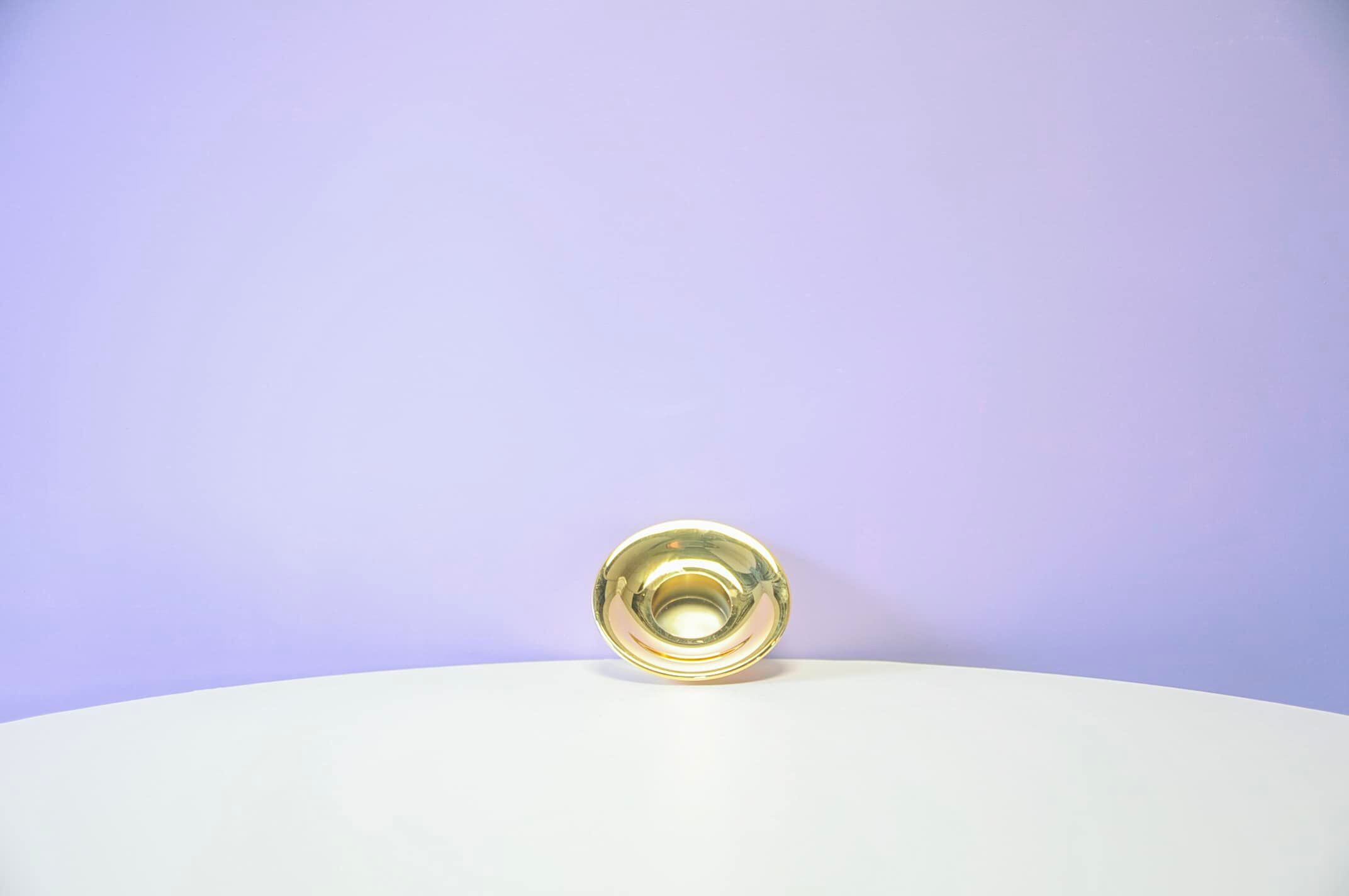 Gold-plated tealight holder Orion by Flemming Eskildsen