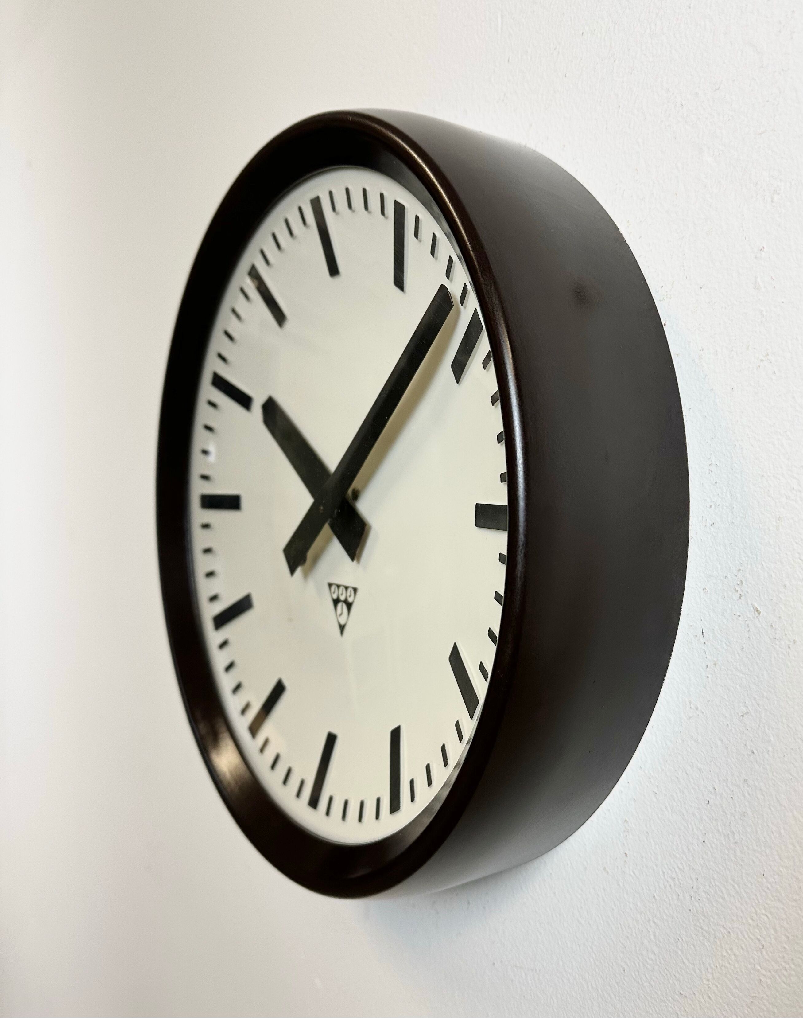 Industrial bakelite factory wall clock from Pragotron, 1960s