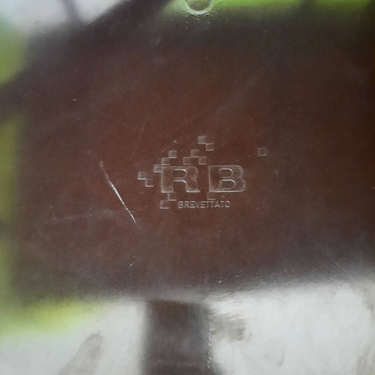 Vintage lacquered top desk with iron structure and pointed brass feet