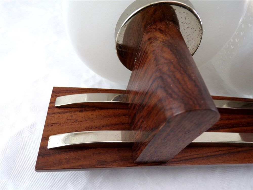 Applies double teak and chrome metal