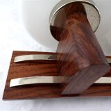 Applies double teak and chrome metal