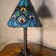 antique wrought iron floor lamp, 1900 to 1940 with stained glass lampshade