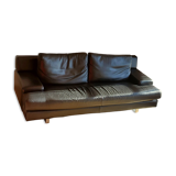 Black leather three-seater sofa