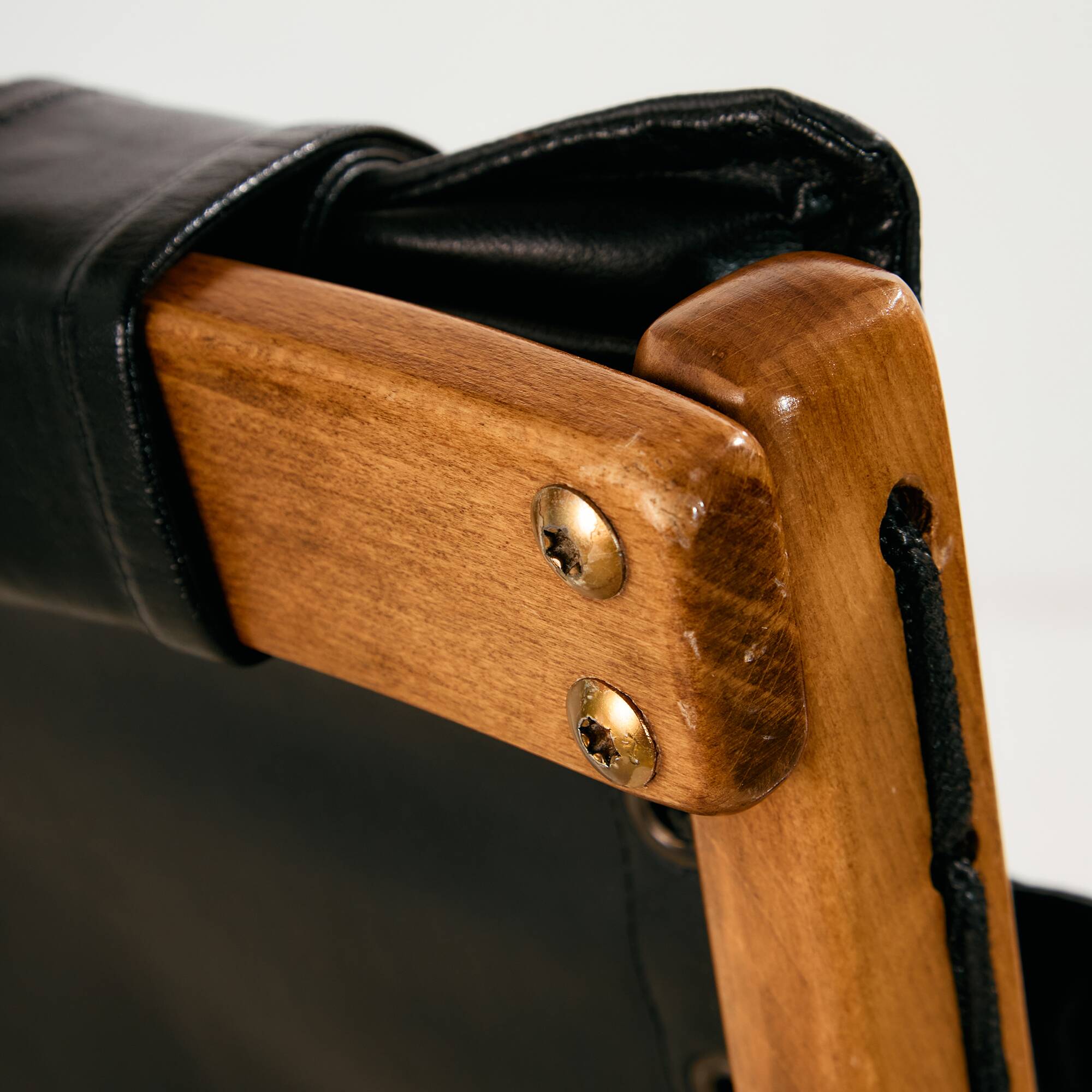 Beech armchair with leather upholstery