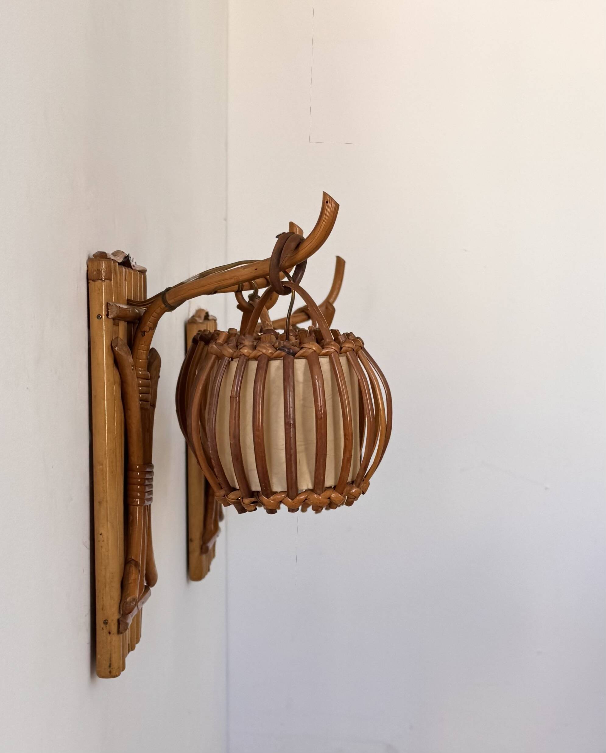 Vintage pair of rattan wall lights, France, 1950.