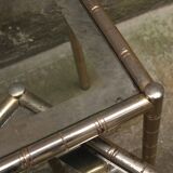 Pair of nesting coffee tables in gold metal with bamboo effect