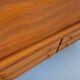 Vintage wooden display bookshelf with drawers from the 1960s.