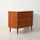 Scandinavian teak and mahogany chest with brass accents