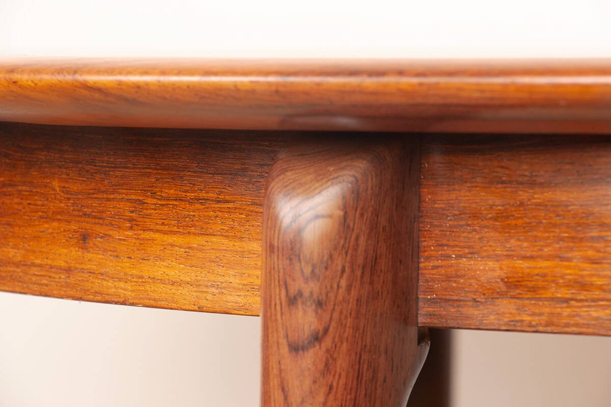 Danish extendable dining table in rosewood by Kai Lyngfeldt Larsen.