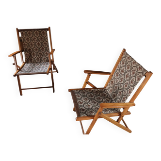 Two vintage folding armchairs
