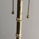Floor lamp in faux-bamboo style, made of bronze and brass by Jacques Adnet
