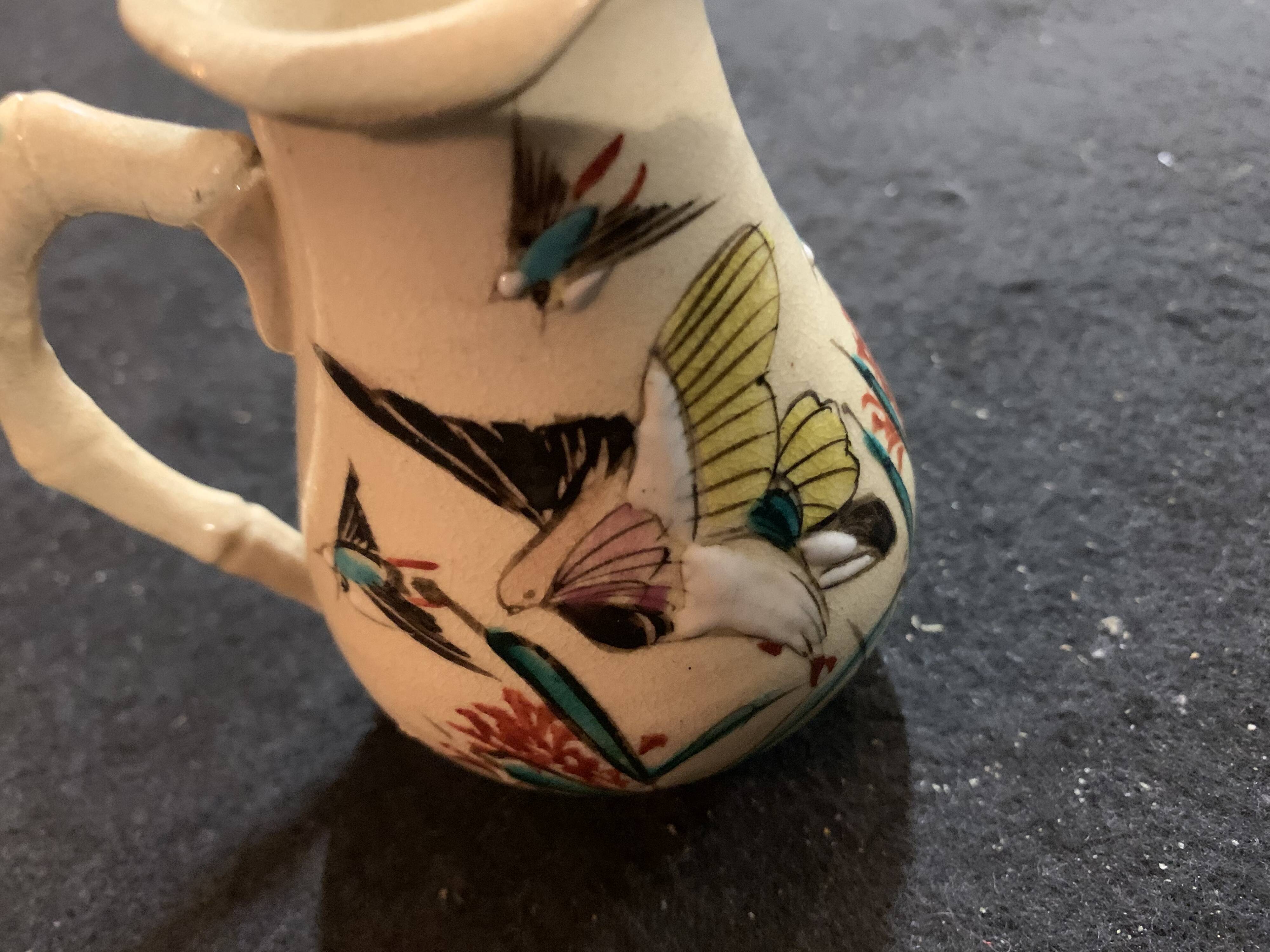 Enamelled porcelain pitcher