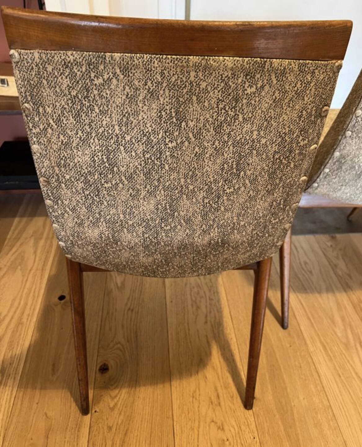 (Lot) 2 teak designer chairs (1950s)