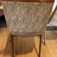 (Lot) 2 teak designer chairs (1950s)