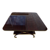 Chic serving table on wheels from the 60s with brass decorations and two shelves.