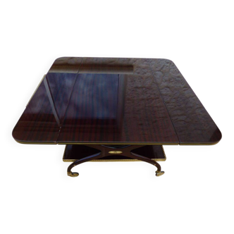 Chic serving table on wheels from the 60s with brass decorations and two shelves.