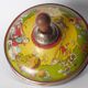Old lithographed spinning top dating from the 1930
