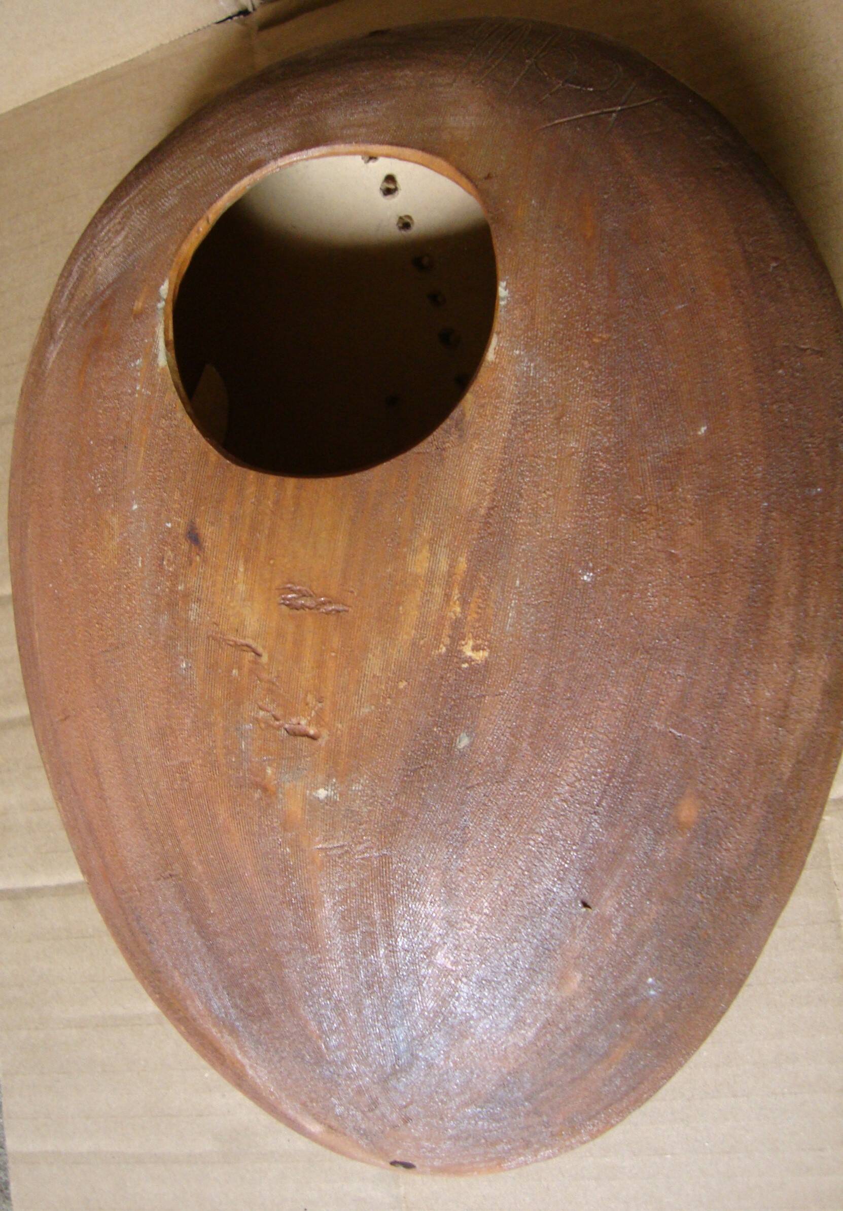 Ethnic ceramic wall lamp signed.